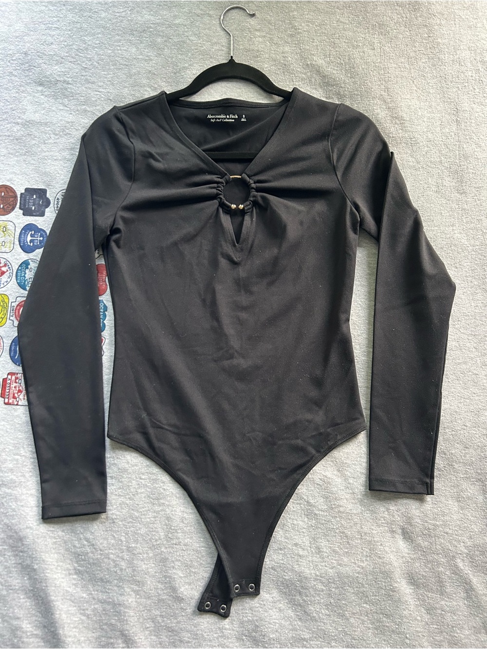 Abercrombie Black Long Sleeve Bodysuit with Front Gold Ring Detail